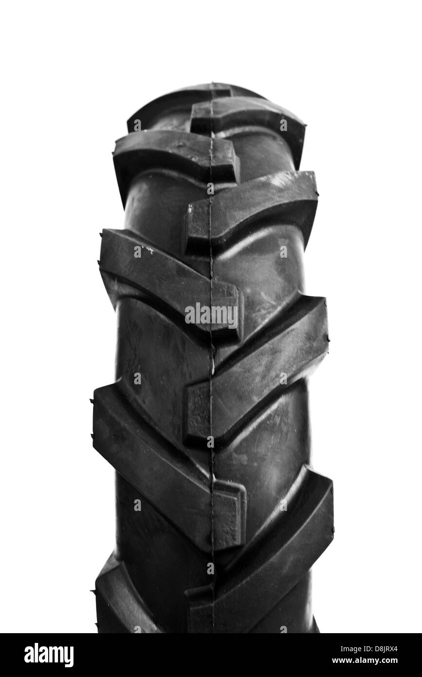 Neue, unbenutzte schwarze Grubber Reifen. Landwirtschaft und Landwirtschaft Hintergrundbild. Stockfoto