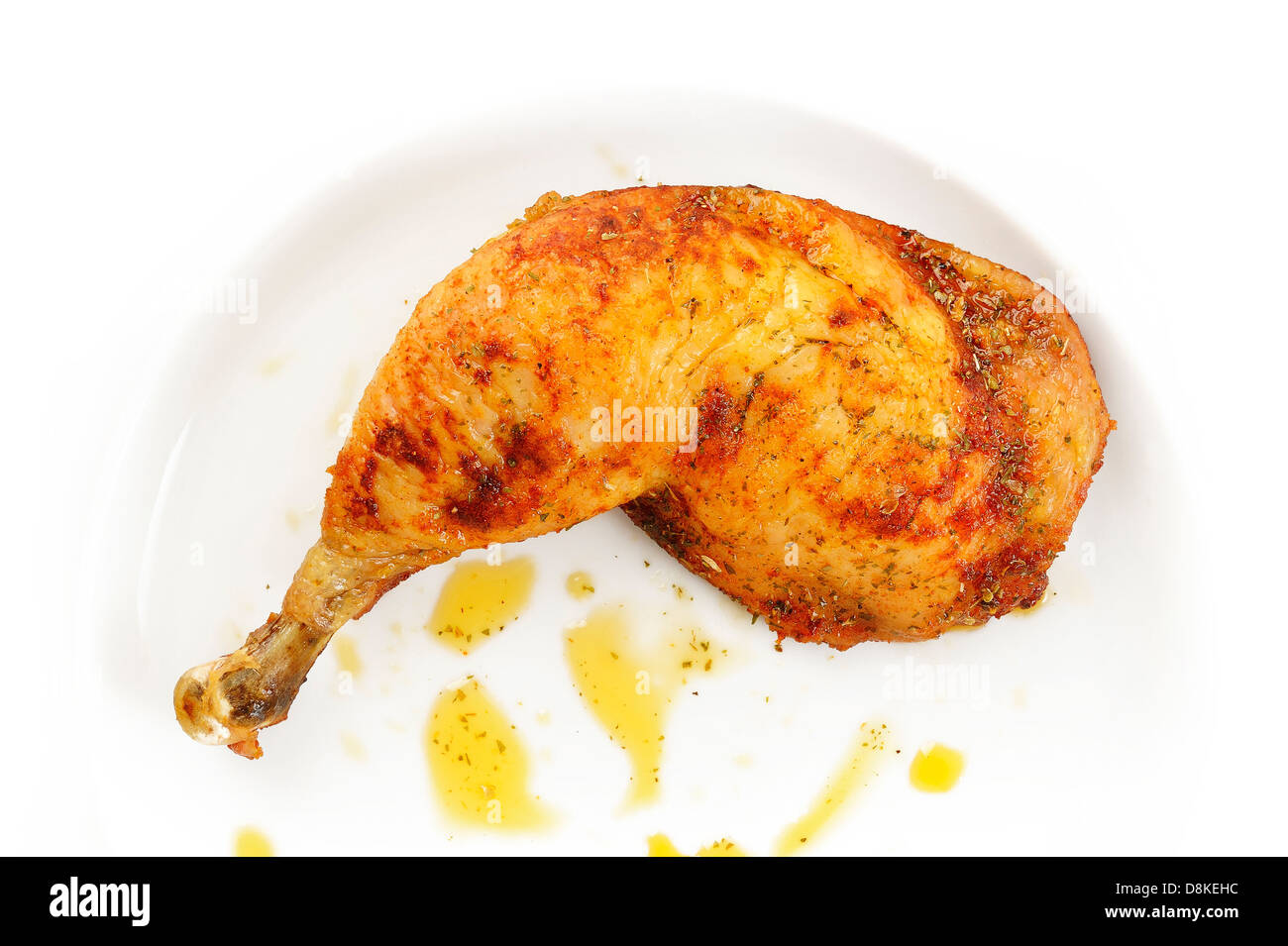 Gegrillte Hühnerkeule auf weißem Hintergrund Stockfoto