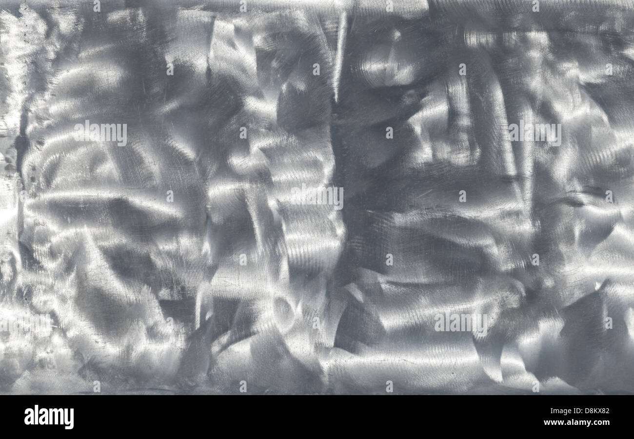 Makroaufnahme einer polierten Stahloberfläche Stockfoto
