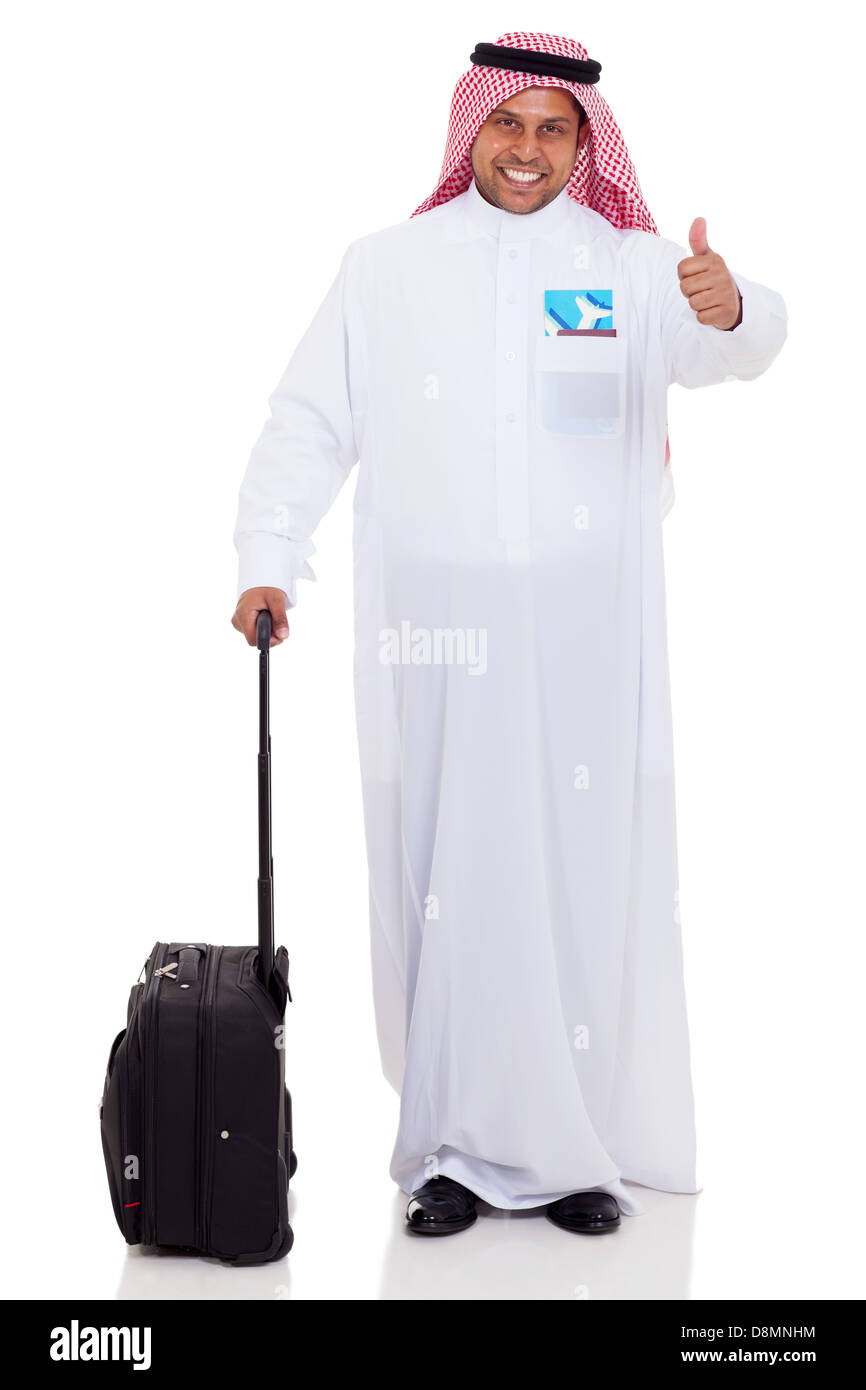 fröhlich-arabischer Milliardär mit Gepäck Daumen aufgeben Stockfoto