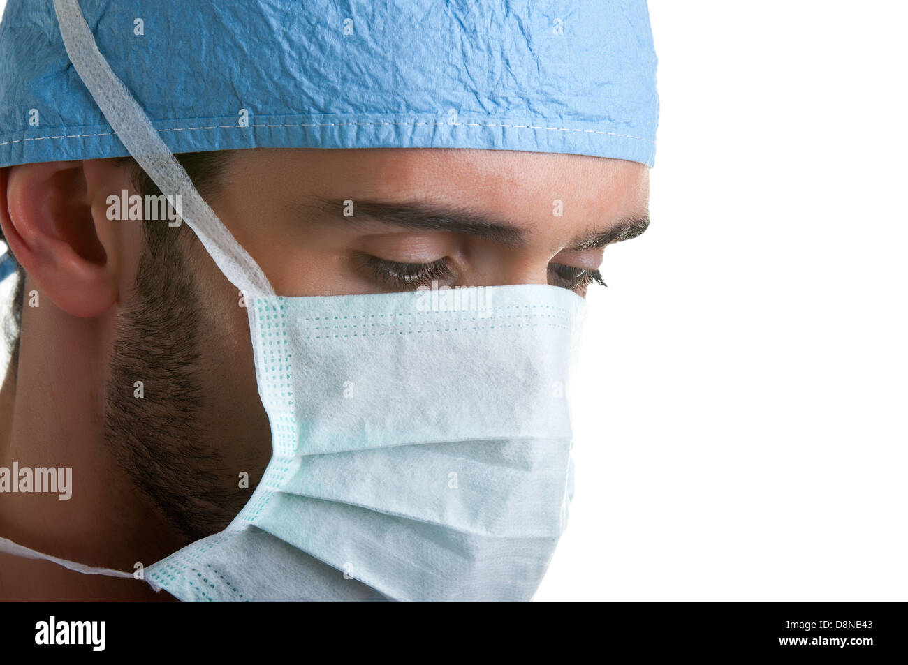 Chirurgen während einer Operation in einem OP-Saal isoliert in weiß Stockfoto