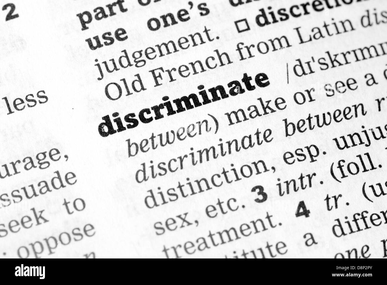 Diskriminieren Wörterbuchdefinition Einzelwort mit soft focus Stockfoto