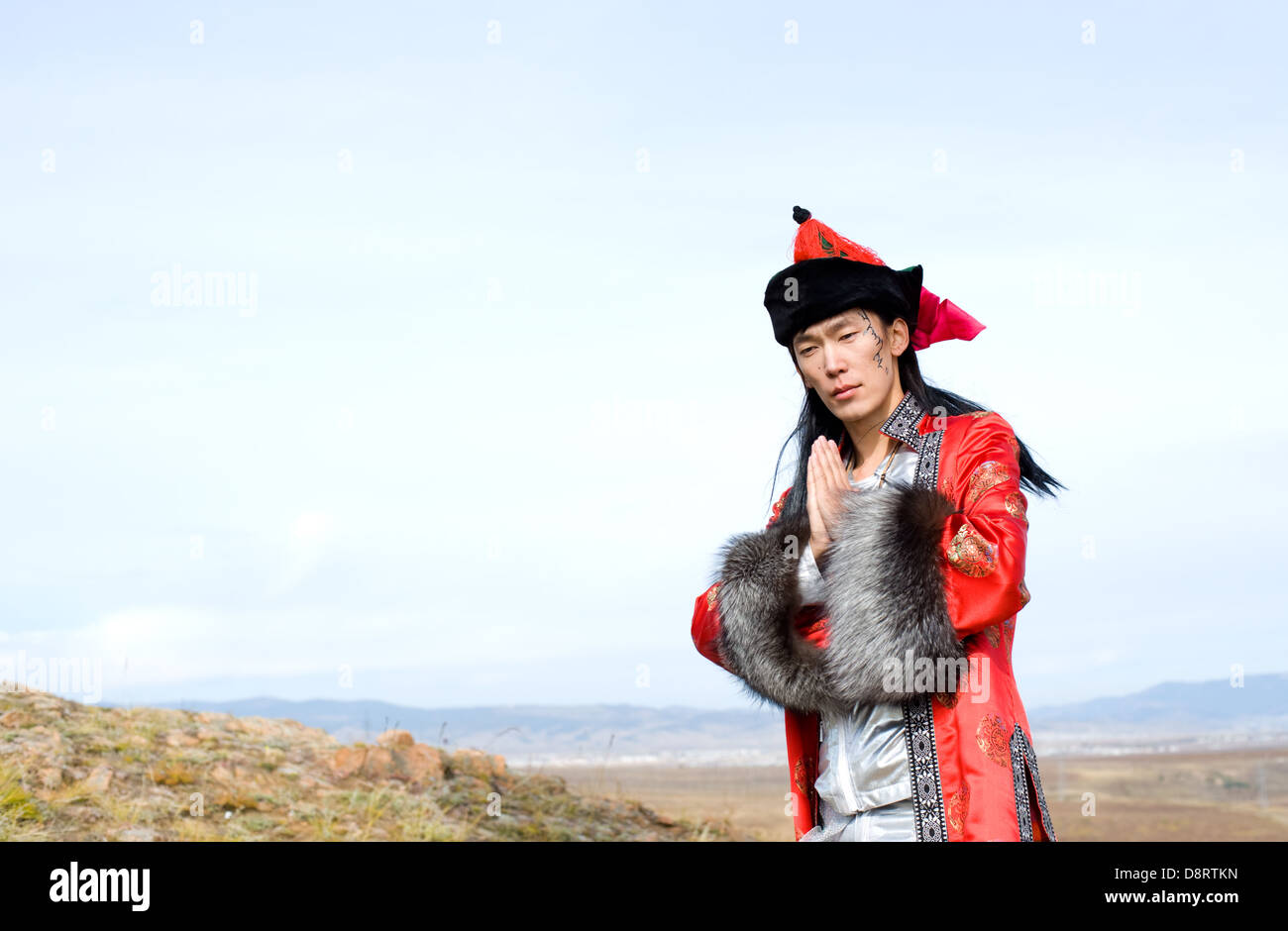Mann im roten mongolischen Kostüm Stockfoto