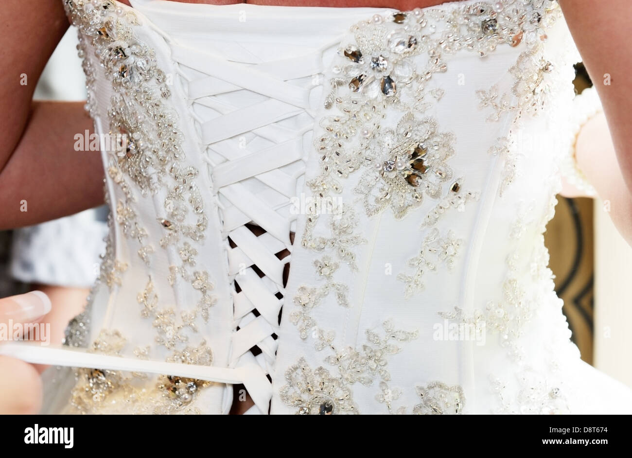 Braut Kleid zurück als Nahaufnahme Detail hergerichtet Stockfoto