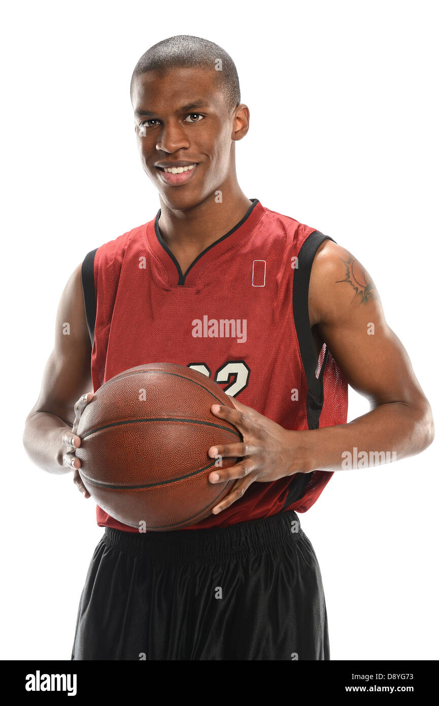 Young African American Basketball-Spieler mit Ball isoliert auf weißem Hintergrund Stockfoto
