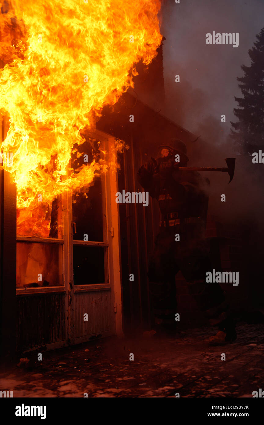 Haus in Brand Stockfoto