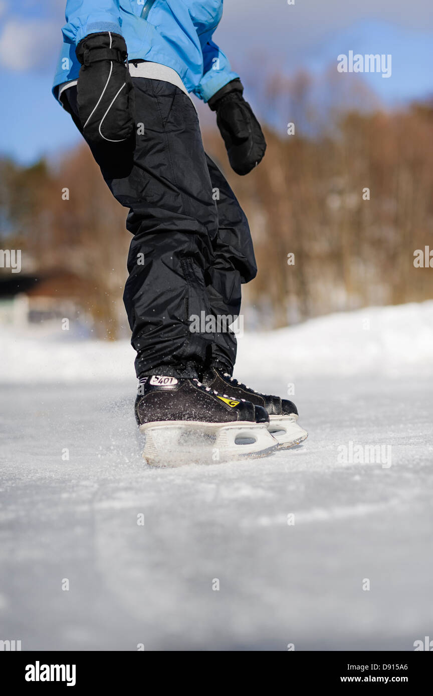 Frau-Eislaufen Stockfoto