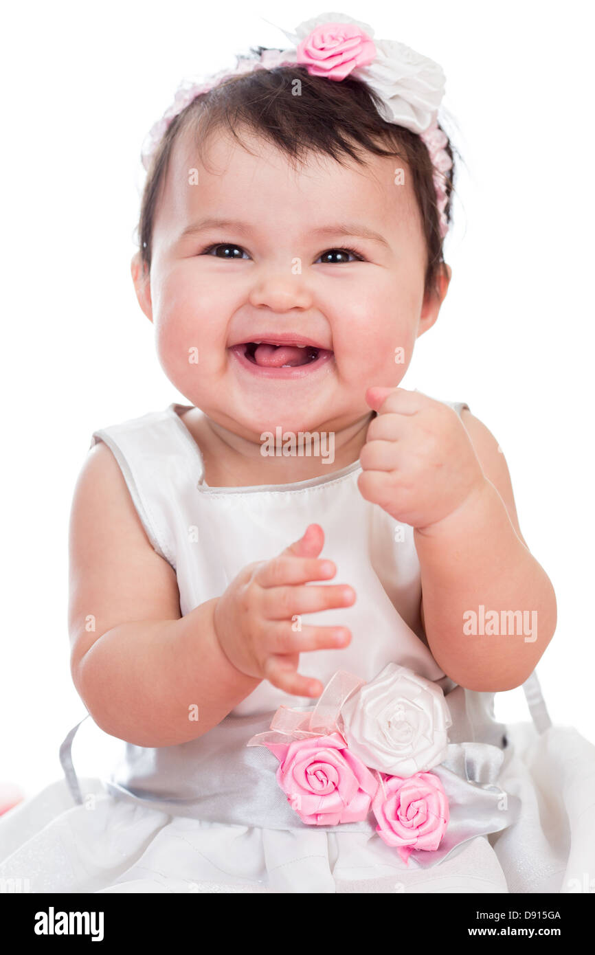 Porträt von lächelndes Babymädchen auf weißem Hintergrund Stockfoto