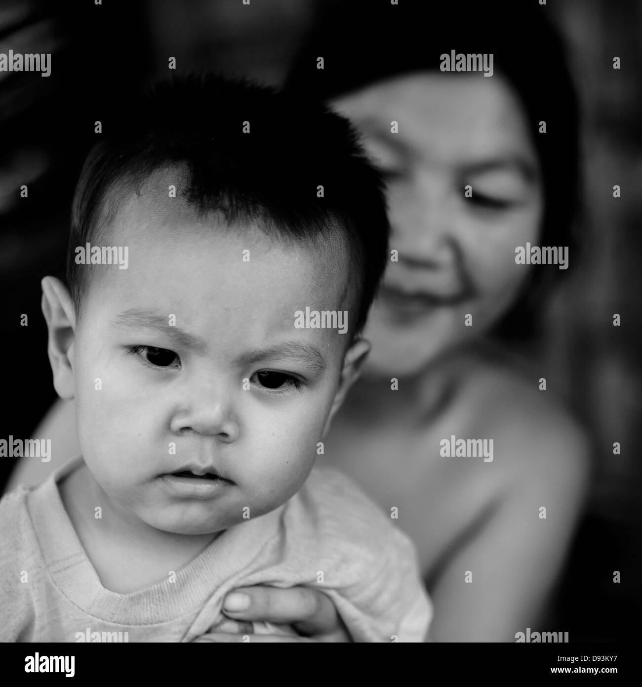 Akha Minderheiten Mutter und Baby, Muang Sing, Laos Stockfoto