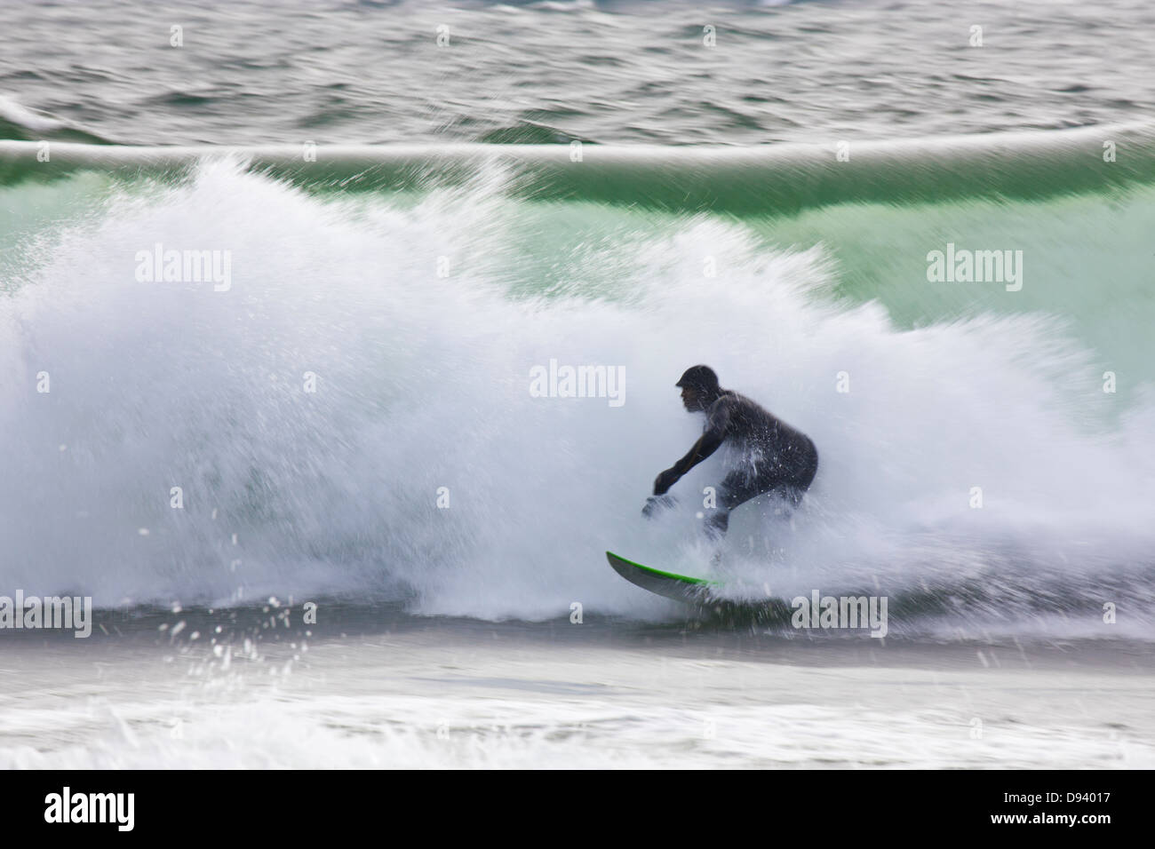 Surfer auf der Welle Stockfoto