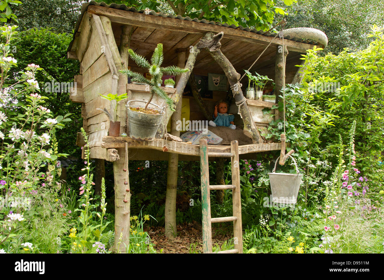 Baumhaus in der was hinterlassen wir? NSPCC Garten magische Kindheit bei RHS Chelsea Flower Show 2013, London, UK. Stockfoto