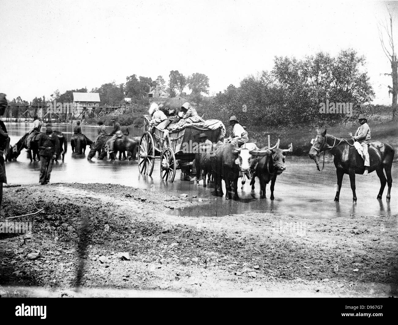 Schwarze Flüchtlinge in Ochsenkarren unterwegs: Amerikanischer Bürgerkrieg 1861-1865. Zu fotografieren. Stockfoto