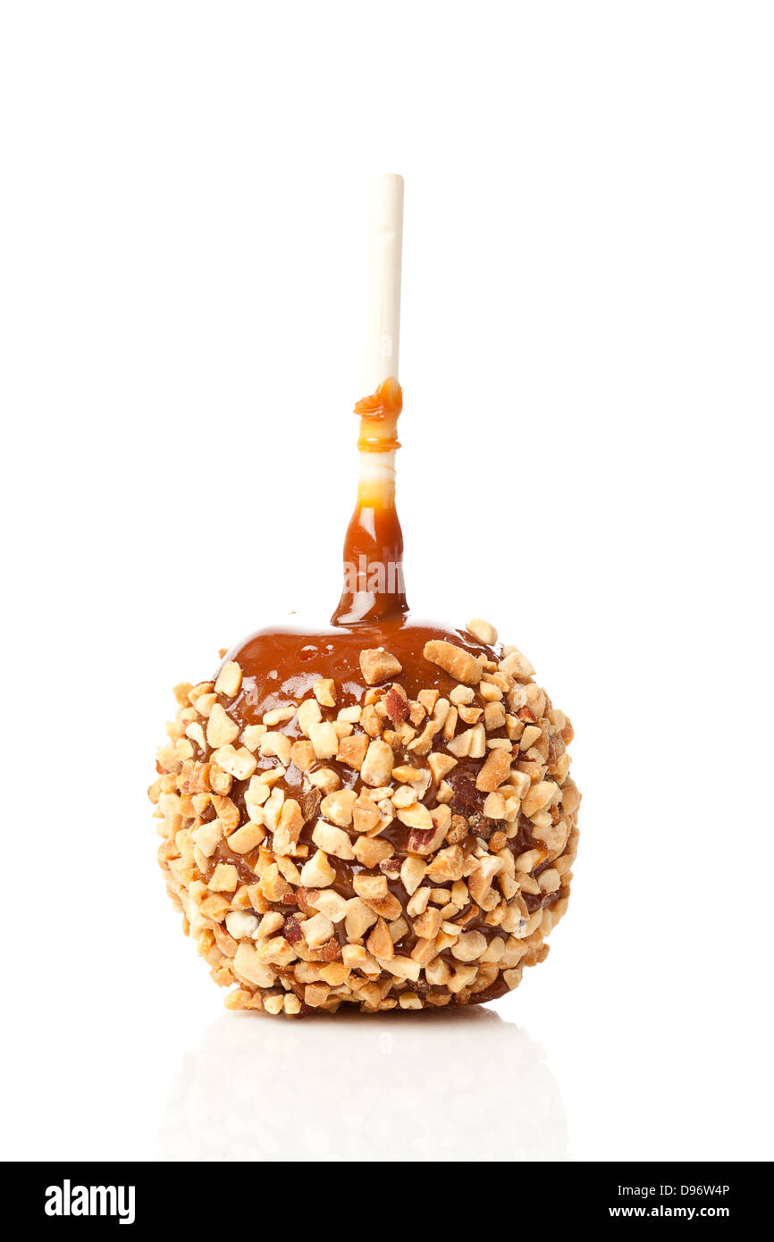 Hausgemachte Taffy Apple mit Erdnüssen gegen einen Hintergrund Stockfoto