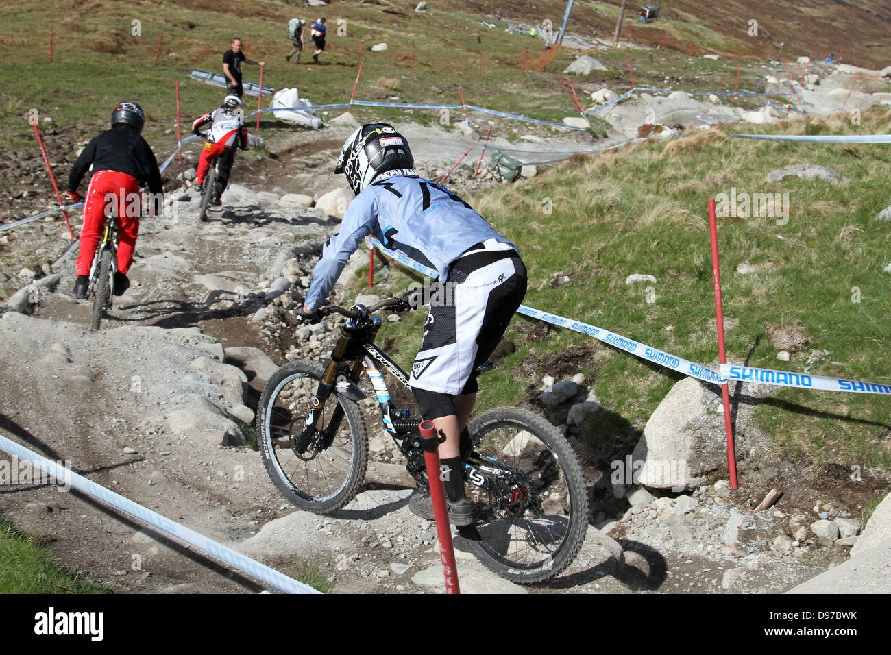 Fahrer auf der Strecke am World Cup Downhill, Fort William 2013 Stockfoto