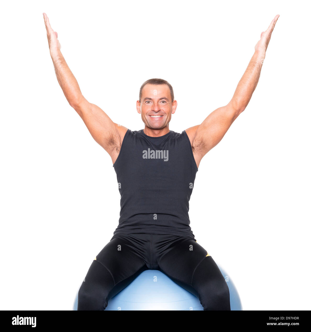 Sport-Mann auf Gymnastik ball Stockfoto