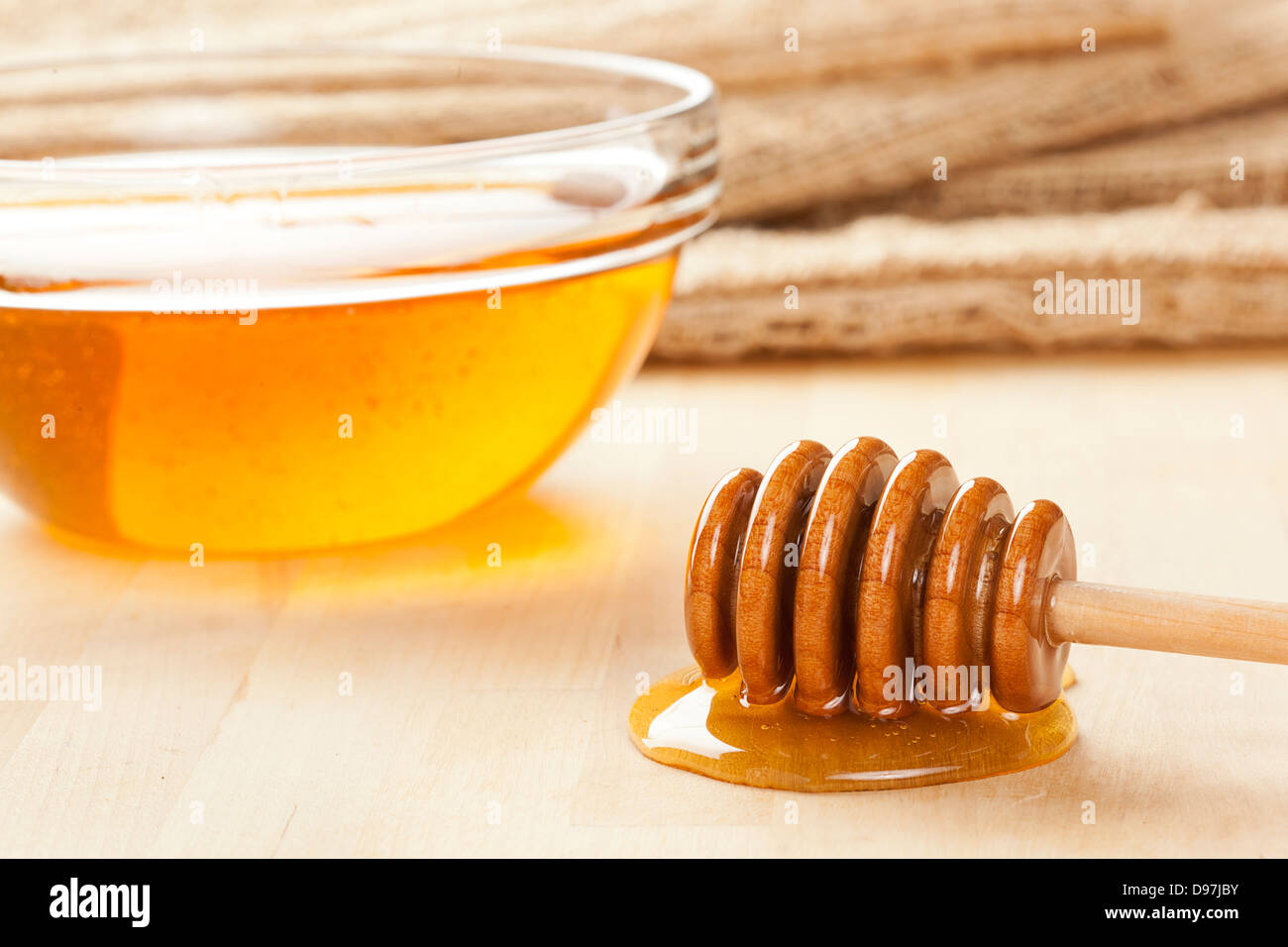 Golden Bio-Honig gegen einen Hintergrund Stockfoto