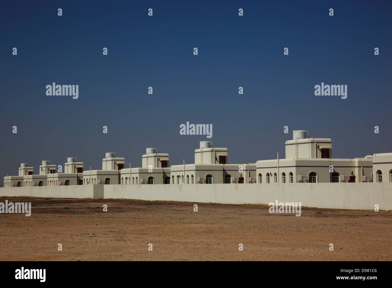 Neubau Siedlungen, von dem Staat Oman für die Neuansiedlung von Arbeitern gebaut?-Lfelder, Oman Stockfoto