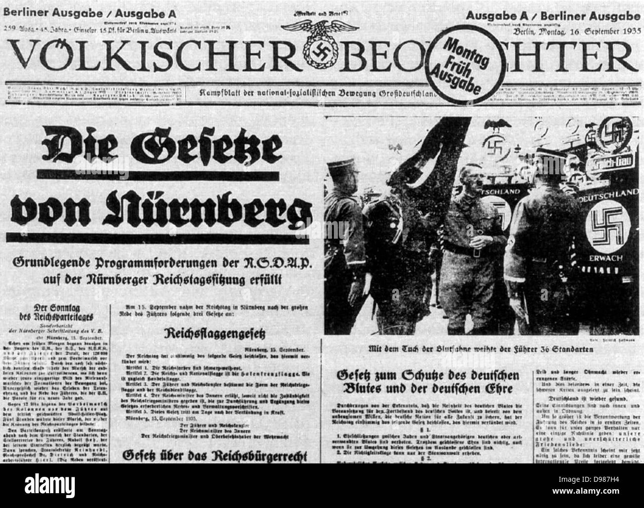 Vordere Seite der Nationalsozialistischen Zeitung "voelkischer Beobachter" vom 16. September 1935 mit der Veröffentlichung der Nürnberger Gesetze (Rennen). Stockfoto