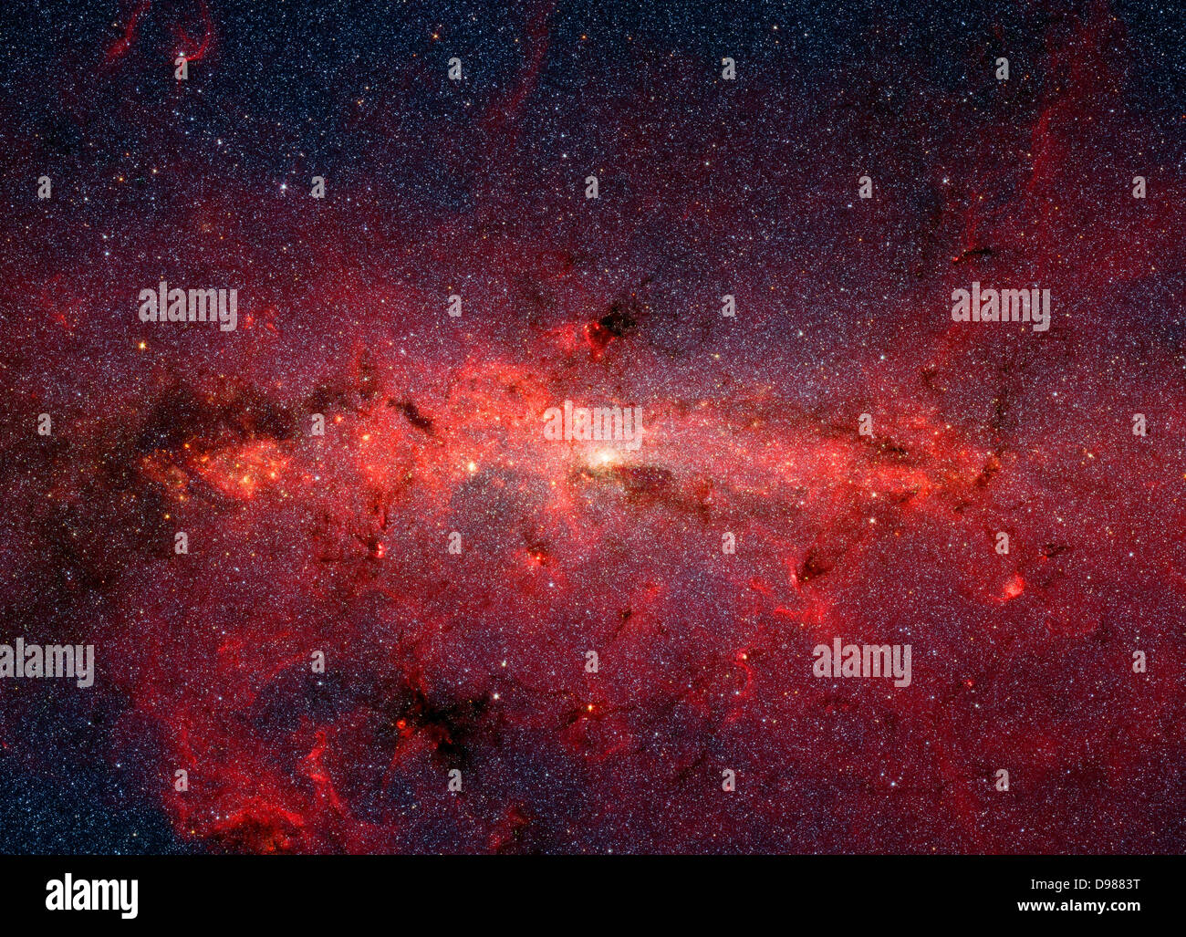 Infrarotbild von NASA's Spitzer Space Telescope zeigt Hunderte von Tausenden von Sternen in den wirbelnden Kern unserer Spirale Milchstraße überfüllt. In sichtbares Licht Bilder, diese Region überhaupt nicht gesehen werden, weil Staub zwischen der Erde und dem galaktischen Zentrum Bausteine unserer Ansicht. Stockfoto