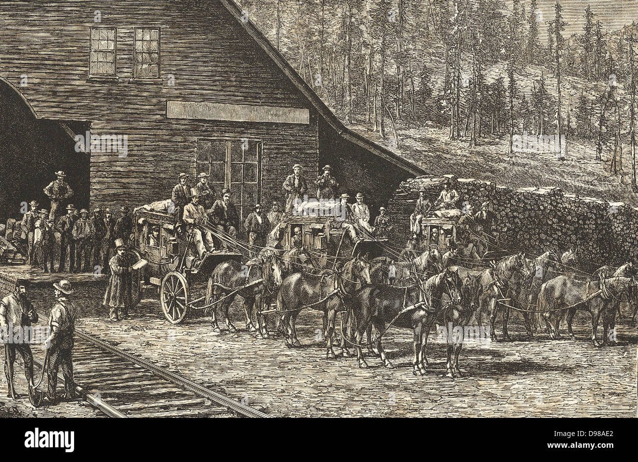 Szene am Bahnhof Reno, Nevada, auf der Central Pacific Railroad, c1876. Postkutschen und ihre Teams warten auf die Ankunft des nächsten Zuges. Gravur. Stockfoto