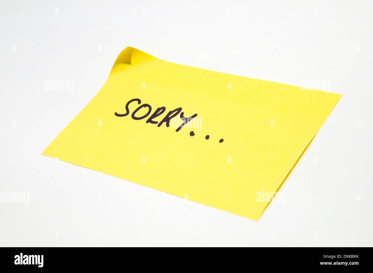 'Sorry' geschrieben auf ein gelbes post-it note Stockfoto