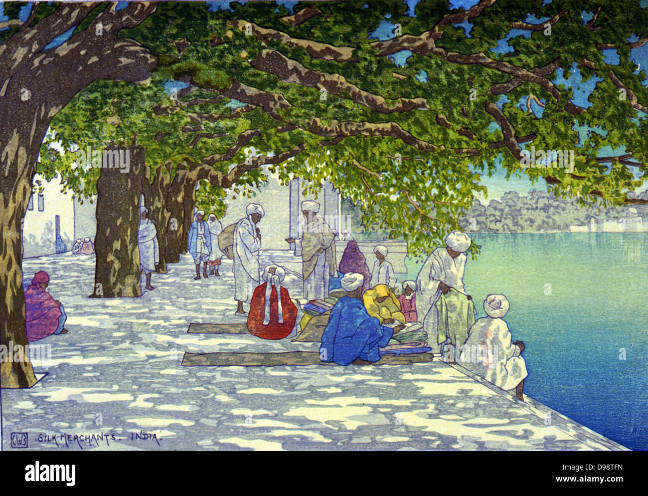 Seide Händler - Indien', c 1920. Charles WIlliam Bartlett (1860-1940), englischer Maler und Graphiker. Zahlen in dappled Schatten von Bäumen auf der Terrasse neben dem blauen See, Haufen von Seide, die gehandelt werden, entfernt. Stockfoto