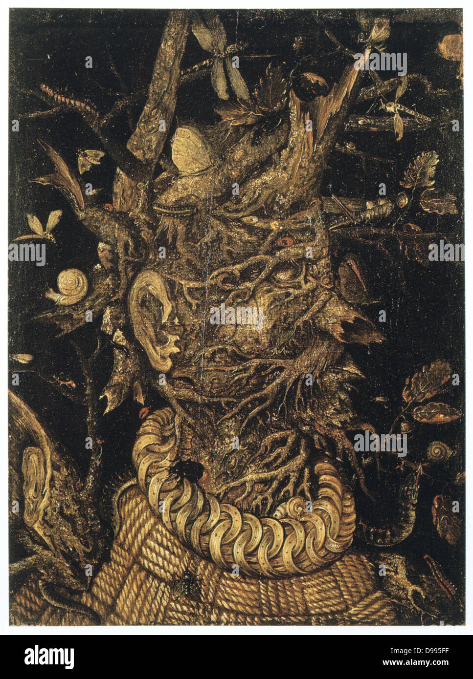 Winter '17. Öl an Bord. Anonym. Grotesker Kopf formte aus Holz, Pilze, Wurzeln und mit Raupen, Motten und Schnecken bedeckt, Alle steigen aus einem Seil Kleid und Metallring. Stockfoto