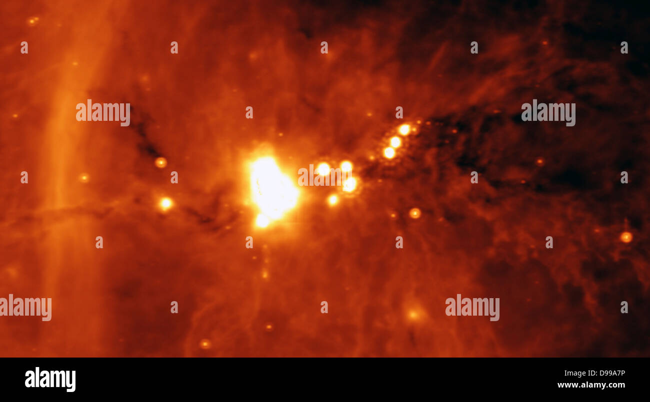 Hinter einer Verkleidung von Staub im Sternbild Schwan ist eine außergewöhnlich helle Quelle der Radiostrahlung namens DR21 versteckt. Sichtbares Licht Bilder zeigen keine, was in dieser Region ist wegen der schweren Staub Schleiern. Spitzer Space Telescope. Stockfoto