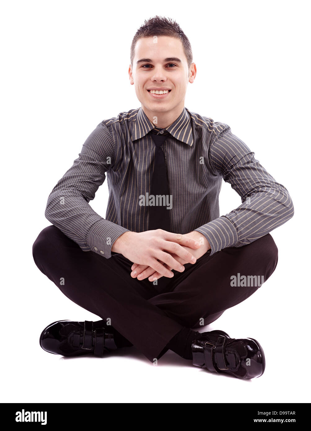 Voller Länge Pose der erfolgreiche Geschäftsmann Schneidersitz auf dem Boden sitzend isoliert auf weißem Hintergrund Stockfoto