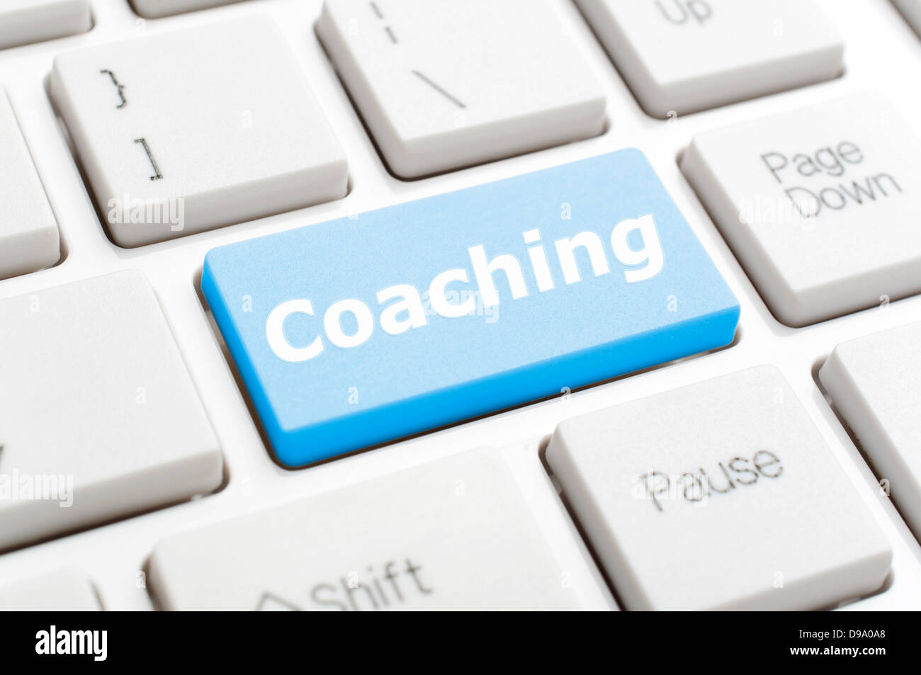 Coaching auf Tastatur Stockfoto
