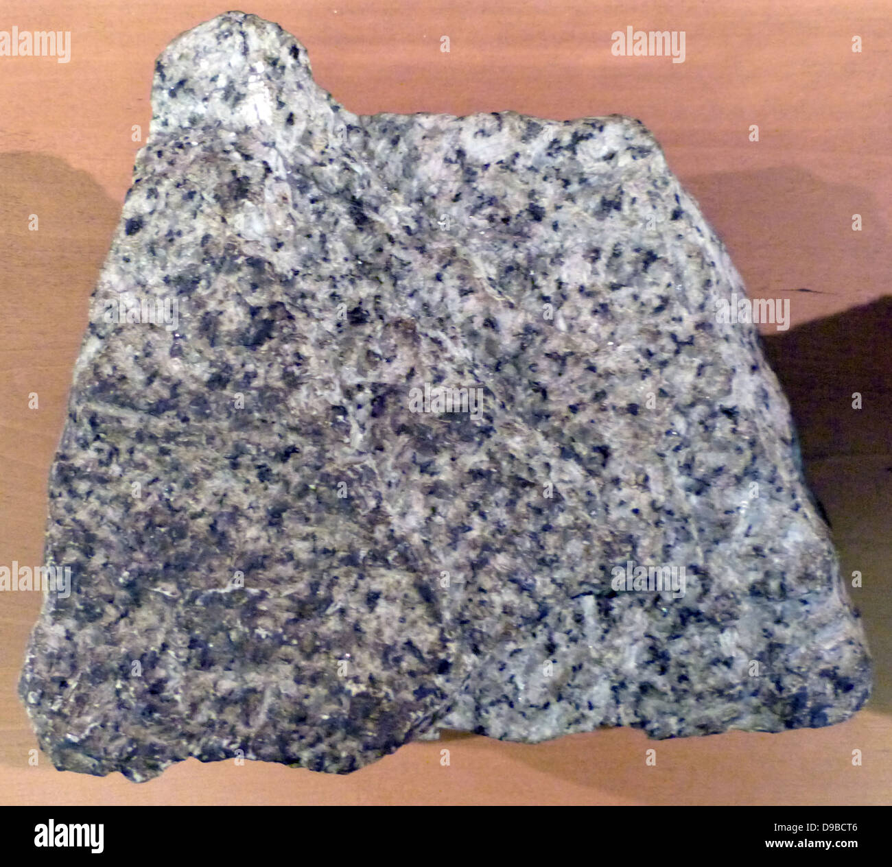 Granit - ist eine häufige und weit verbreitete vorkommende Art der aufdringlichen, Felsic, eruptivgestein. Granit hat normalerweise einen grobkörnigen Textur. Gelegentlich einige einzelne Kristalle sind größer als die Groundmass, in diesem Fall die Textur ist bekannt als Porphyritic. Stockfoto
