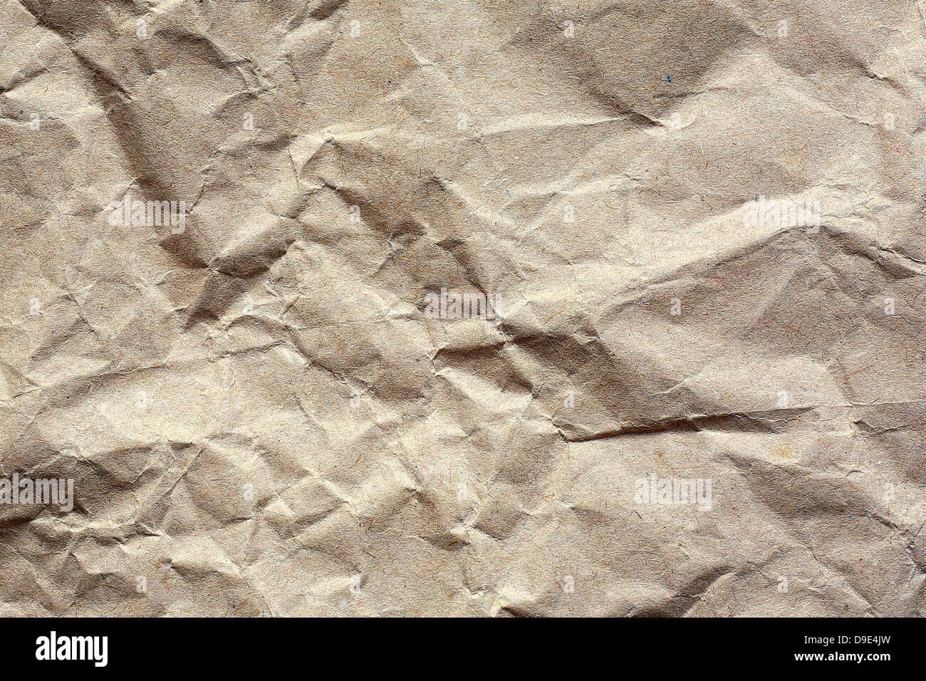 Textur der zerknittertes Papier braun Stockfoto