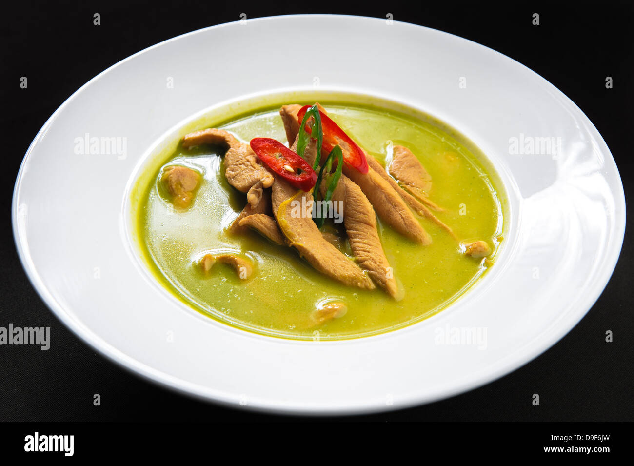 Hühnerfleisch mit grünem curry Stockfoto