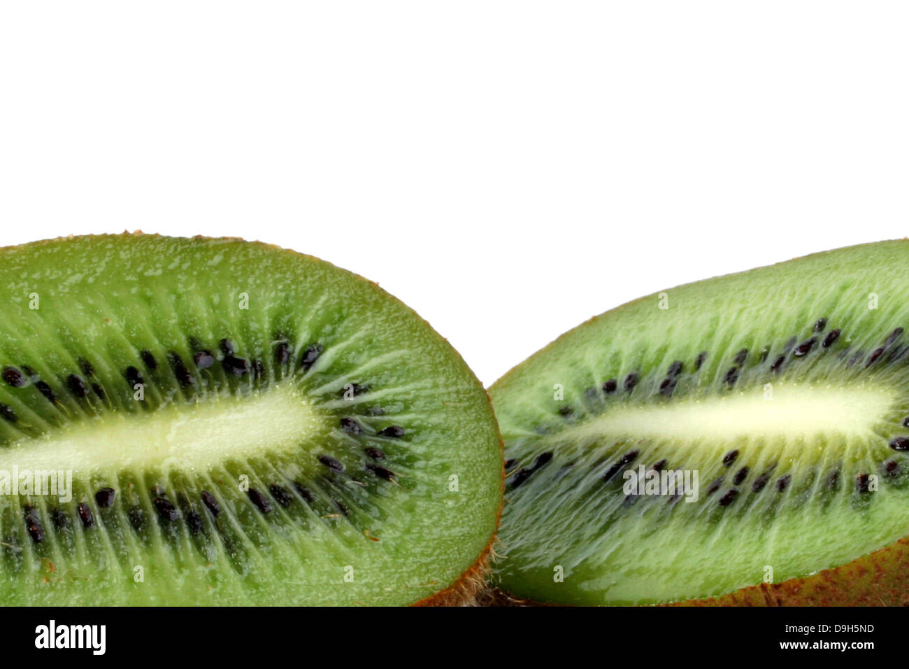 Kiwi (aufgeschnitten) Stockfoto