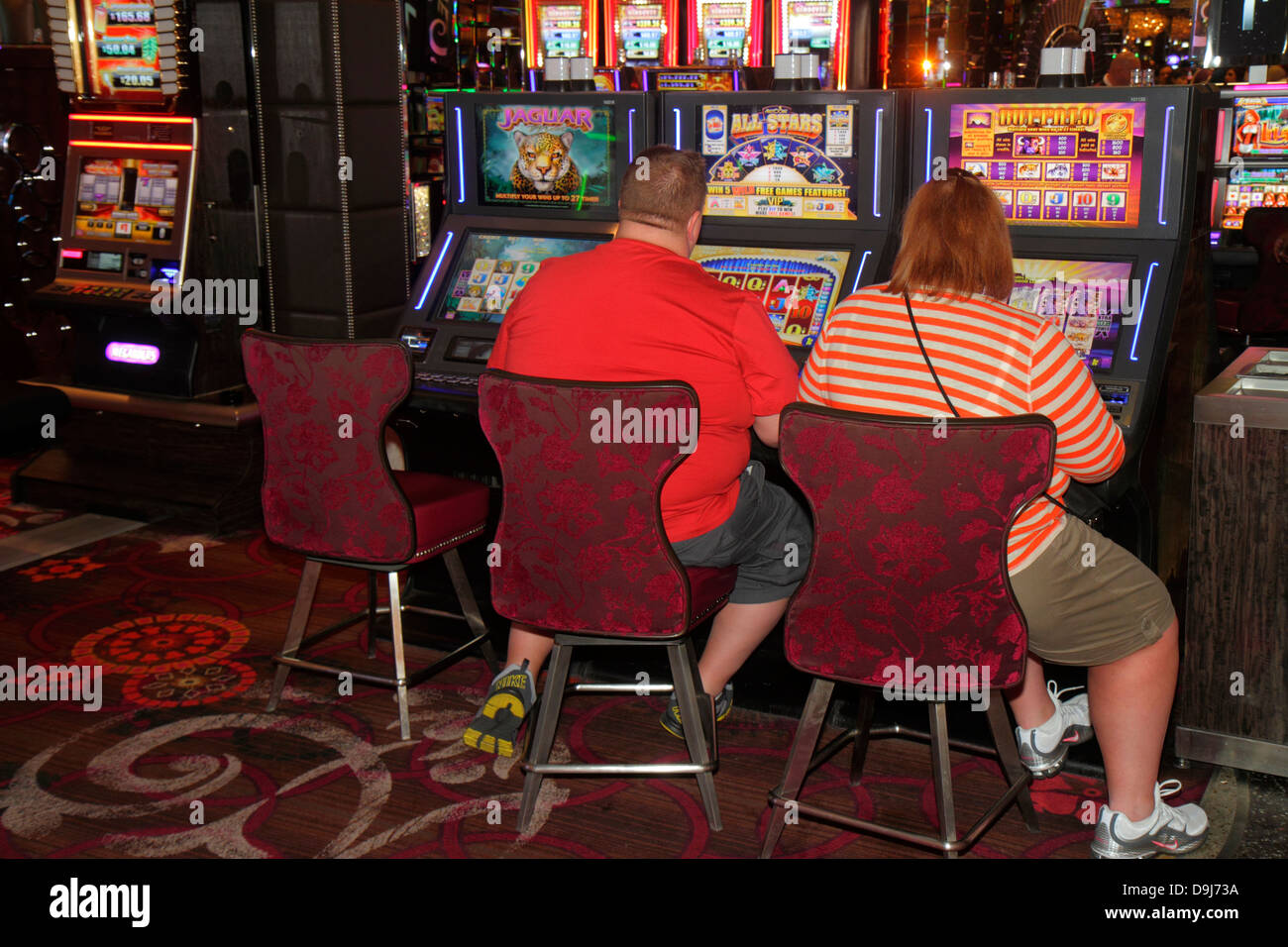 Las Vegas Nevada, The Strip, South Las Vegas Boulevard, Cosmopolitan Hotel Las Vegas, Casino, Spielautomaten, Maschinen, Mann, Männer, Frau, Frauen, Paar, Stockfoto