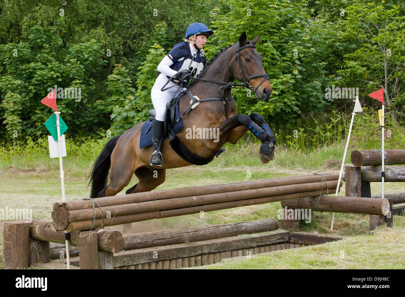 Ein Konkurrent, die Teilnahme an einer ein-Tages-Veranstaltung. Die Veranstaltung besteht aus Dressur-, Spring- und Cross Country. Stockfoto