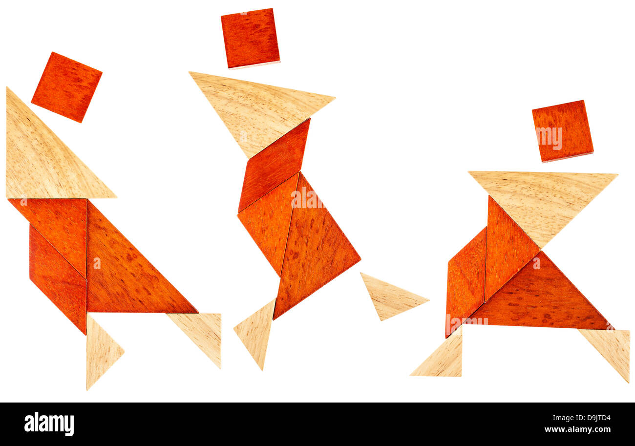 drei abstrakte Figuren eines Tänzers oder vielleicht Kampfkünstler aus sieben Tangramsteine aus Holz gebaut Stockfoto