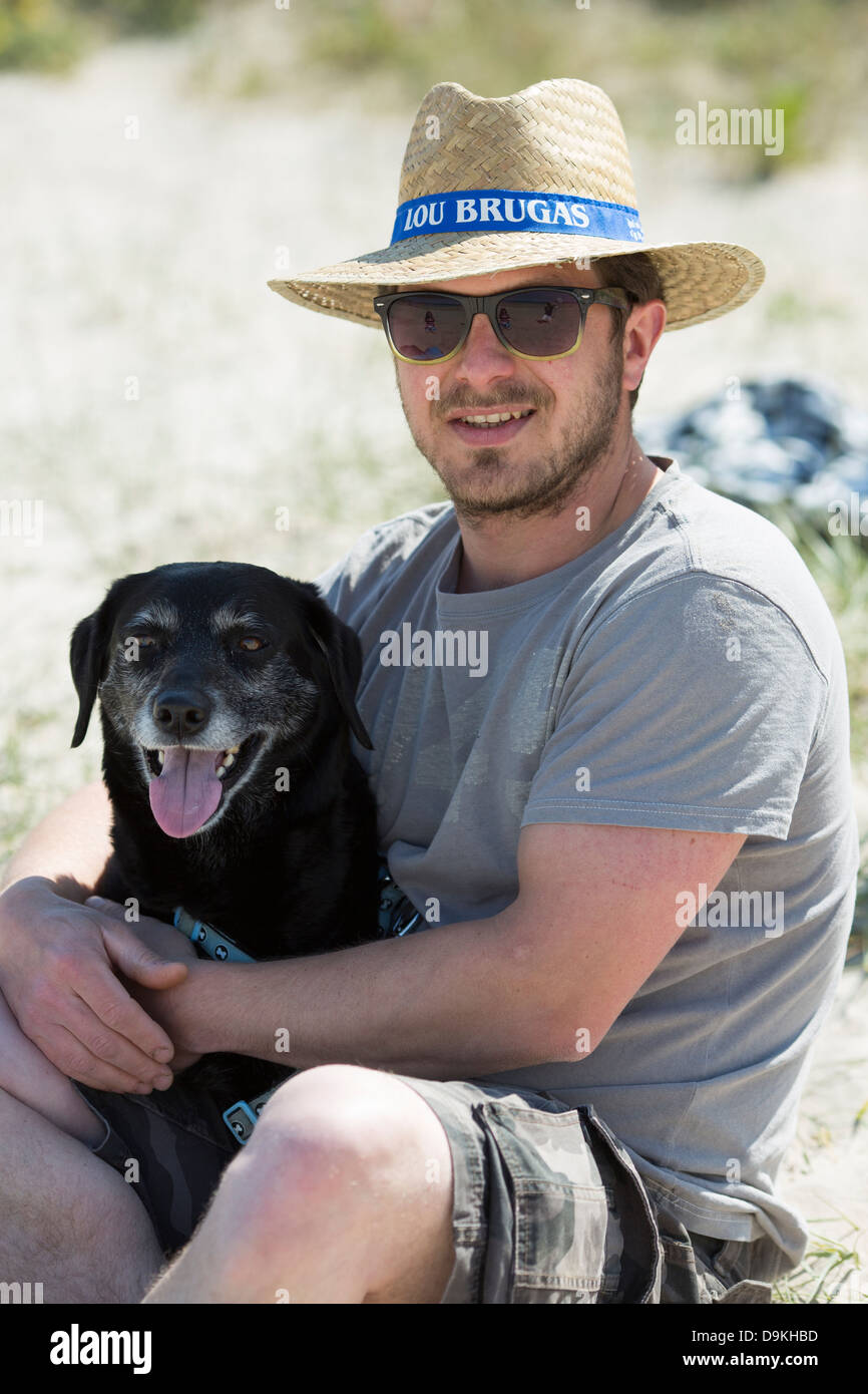 Mann mit Hund Stockfoto