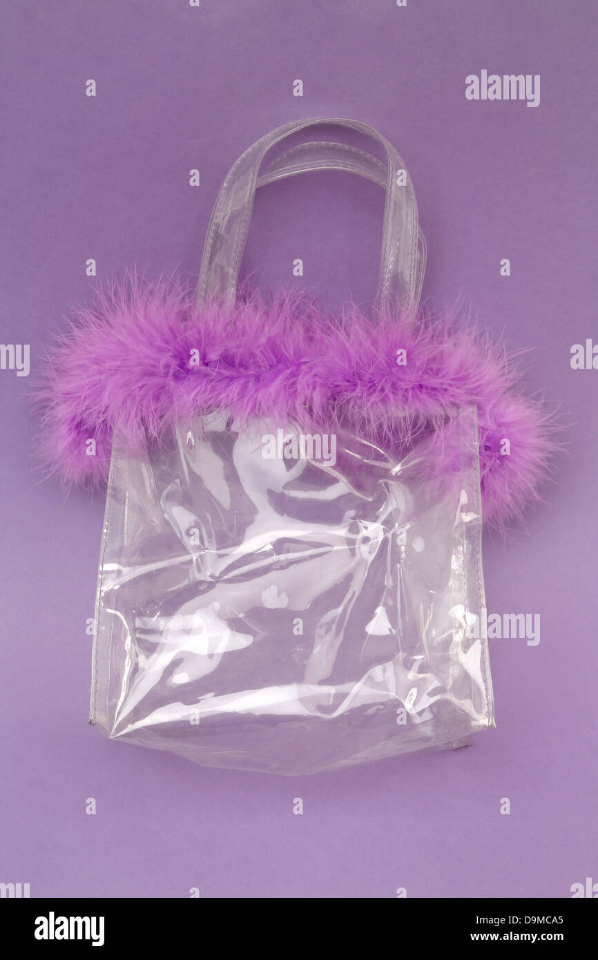Transparente Tasche mit Mauve gefiederte Top Stockfoto