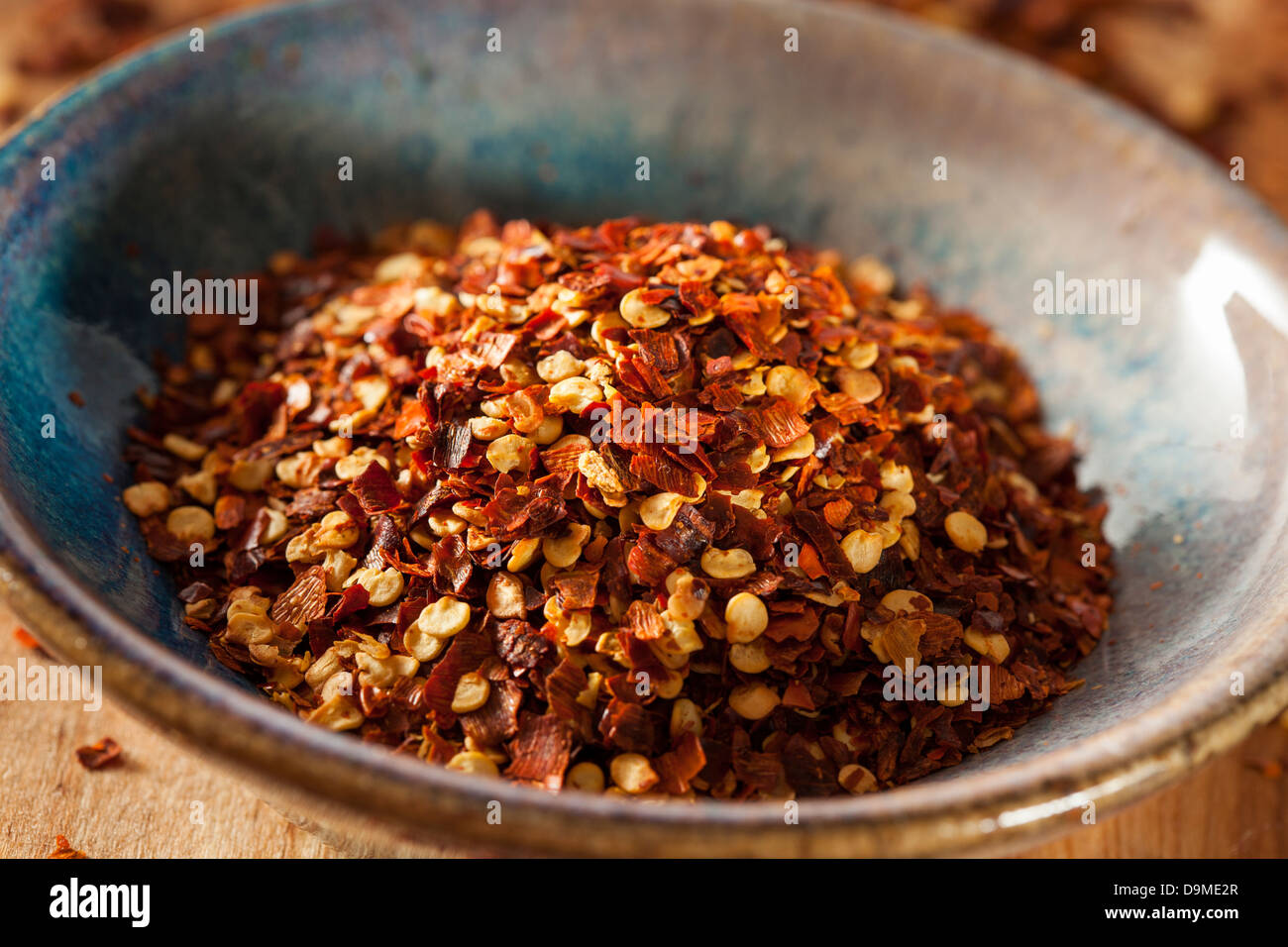 Bio würzige Paprikaflocken zum Kochen verwendet Stockfoto