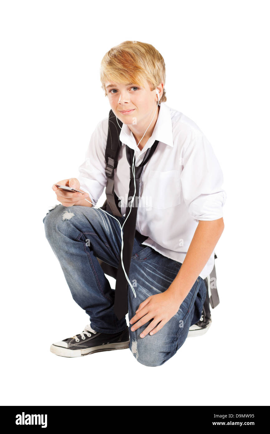 junge Teenager mit Handy oder MP3-player Stockfoto