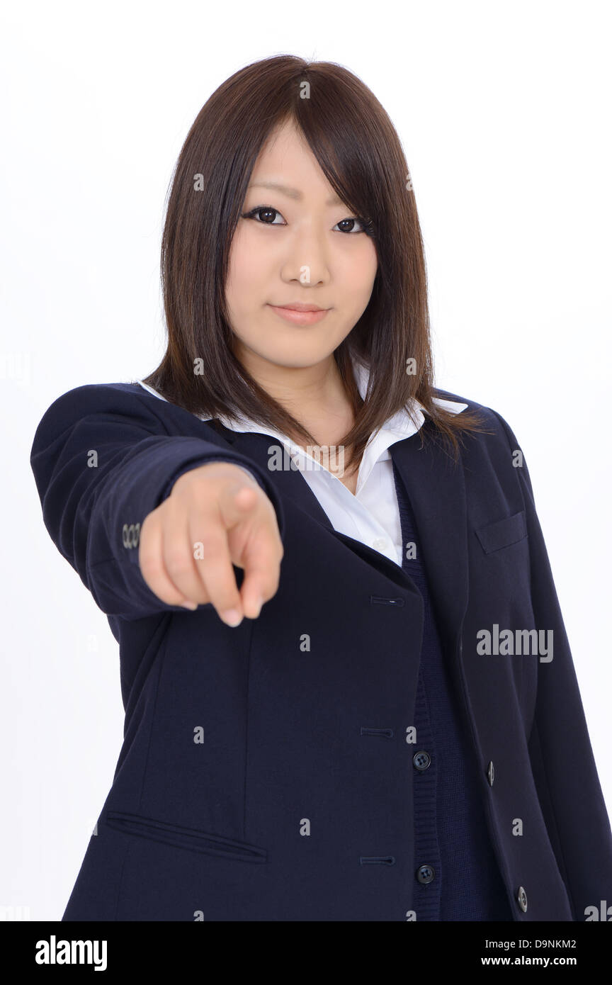 Junge asiatische Geschäftsfrau Aufstieg Hand und deutete vor Stockfoto