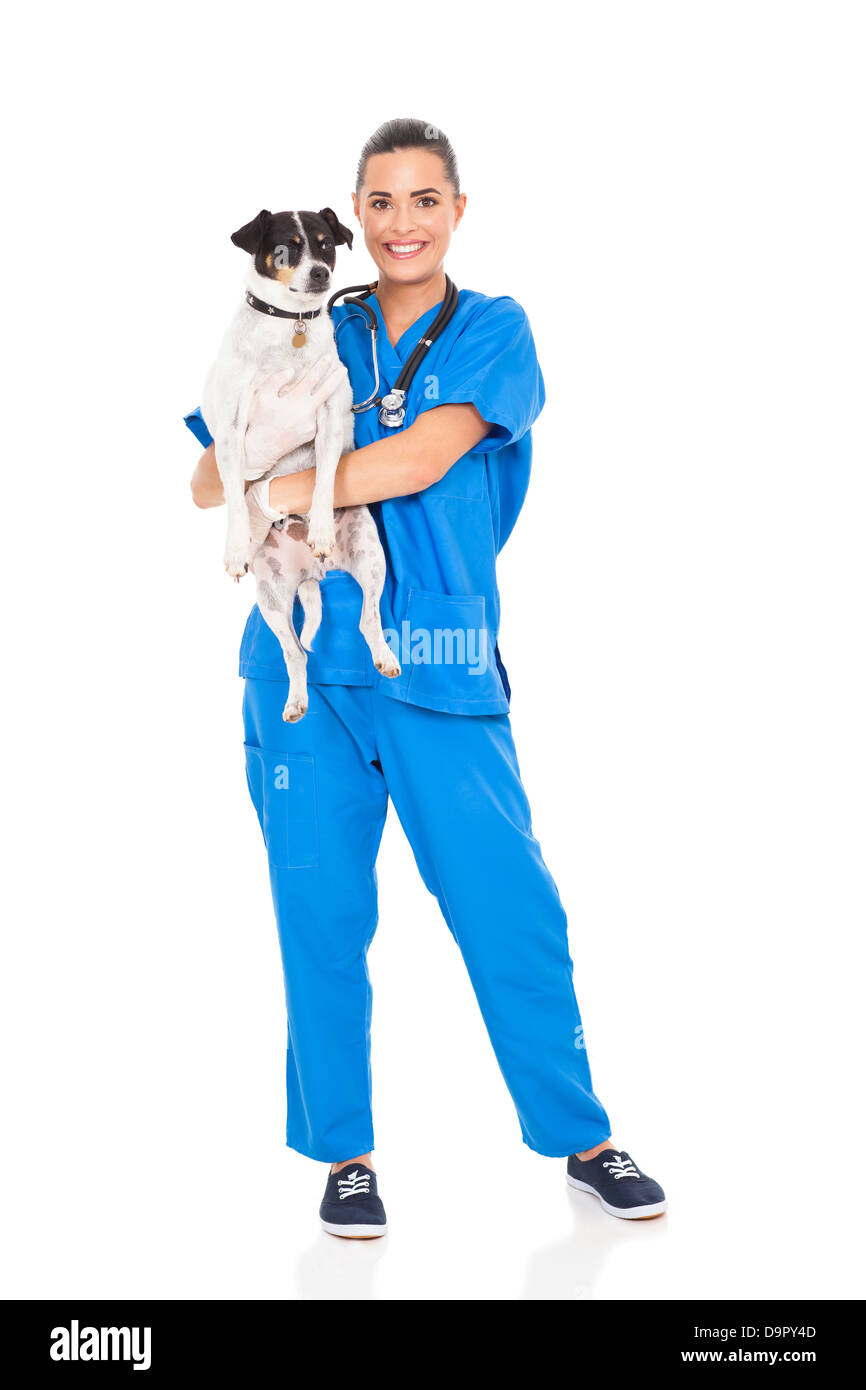 Tierarzt-ziemlich Arzt halten Hund isoliert auf weiss Stockfoto