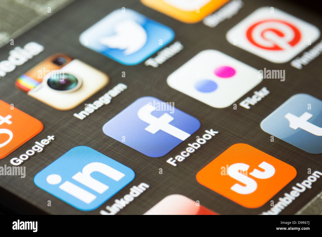 Social-Media-app-Symbole auf einem Apple iPhone 5 Stockfoto