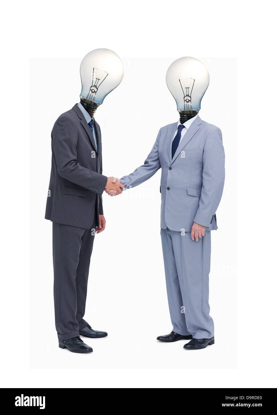 Geschäftsmann mit Glühbirne Köpfe Begrüßung mit Handschlag Stockfoto