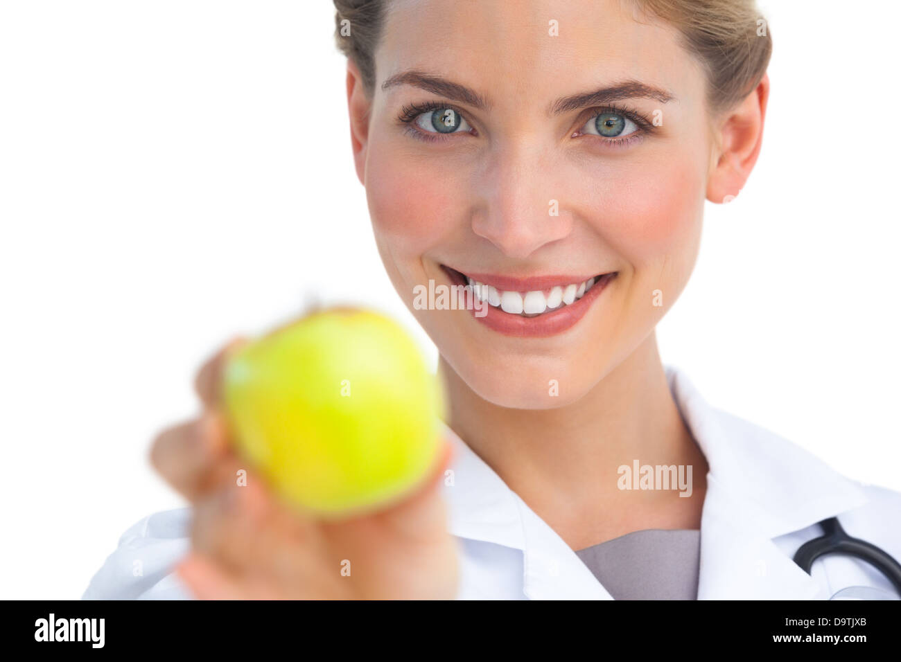 Fokus auf Krankenschwester hält Apfel gedreht Stockfoto