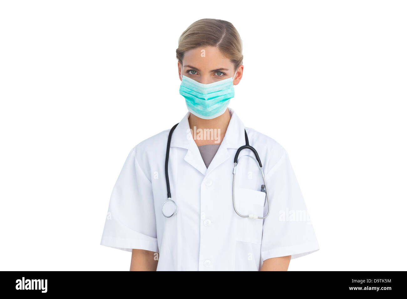 Ernsthafte Krankenschwester tragen Mundschutz Stockfoto