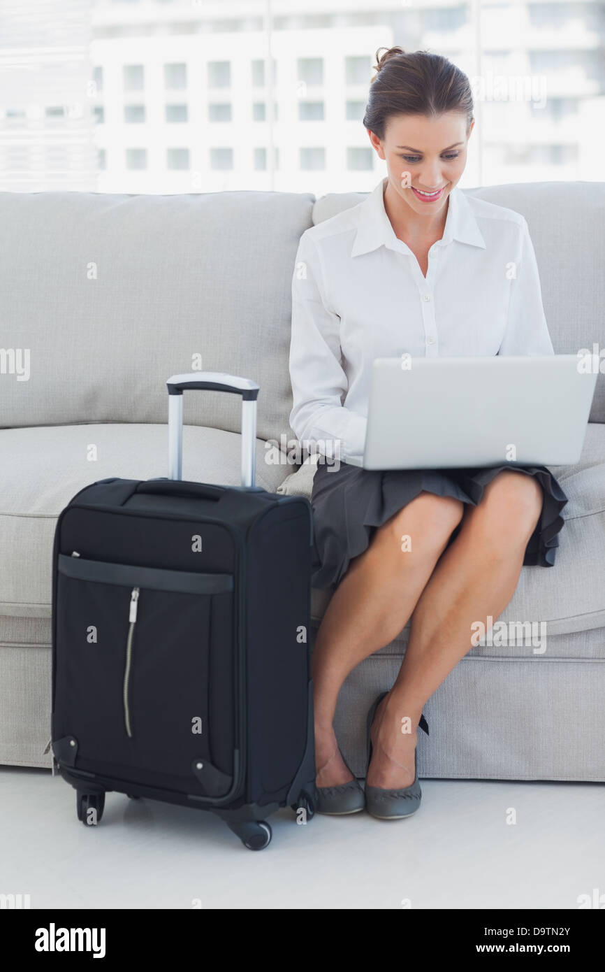 Business-Frau sitzen auf der couch Stockfoto