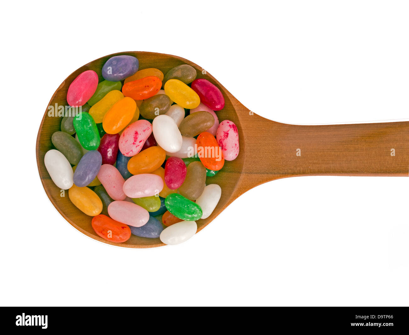 Jellybeans auf Löffel, weißer Hintergrund Stockfoto