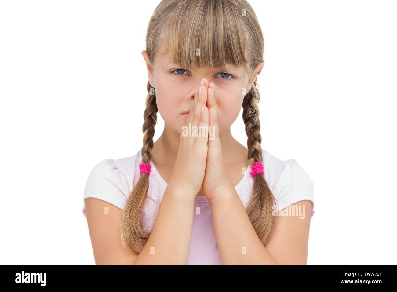 Kleines Mädchen mit ihren Händen im Gesicht Stockfoto